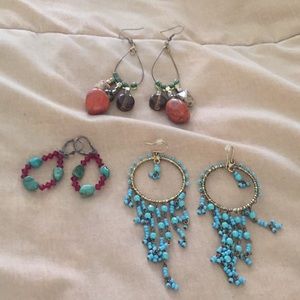 Three fashionable dangling earrings